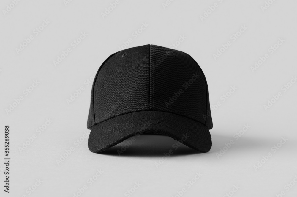 Black baseball cap mockup on a grey background, front view. - obrazy, fototapety, plakaty 