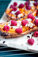 Wall Mural - Roasted Pumpkin with Cream Cheese, Raspberries, Pine Nuts and Balsamic Sauce, Healthy Salad