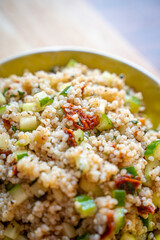 Wall Mural - Healthy Salad with Barley, Sun Dried Tomatoes, Cucumber, Lemon Juice, Olive Oil and Herbs