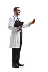 Sticker - Male doctor holding a bottle of pills