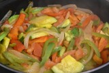 Fototapeta  - a lot of vegetables being cooked