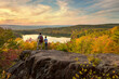 © romylee - father and son hike to a beautiful overlook in the fall