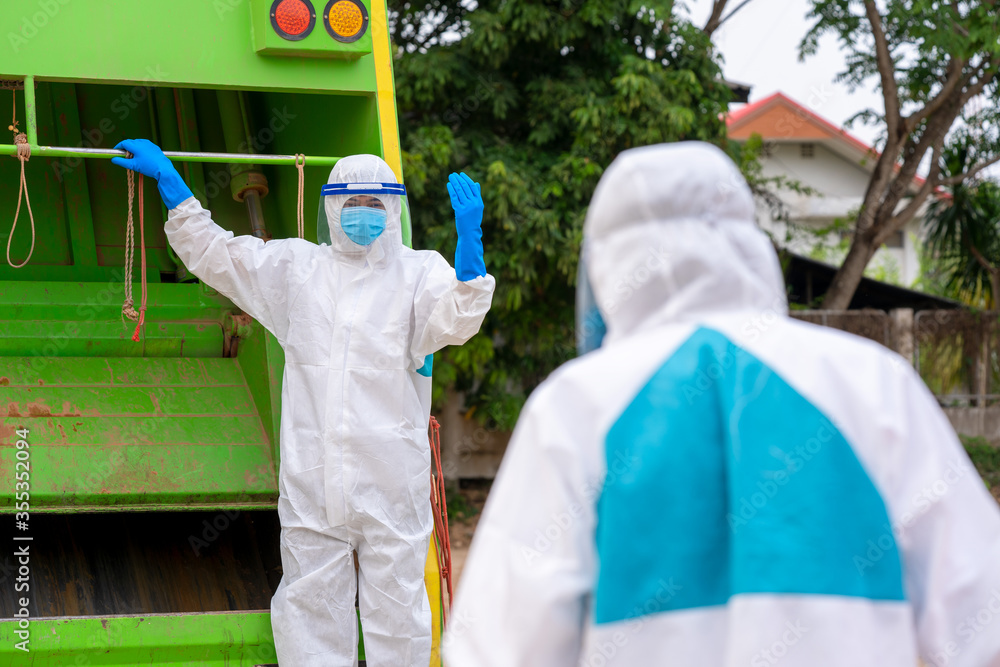 Biohazard Men Stop biohazard,Garbage men in coronavirus hazmats working together on ...