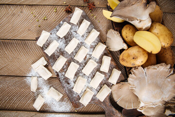 Wall Mural - Semi-finished potato mushroom dumplings vareniki