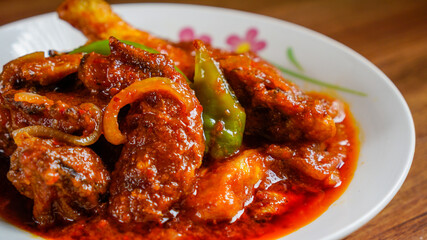 Wall Mural - Ayam masak merah is a Malaysian traditional dish