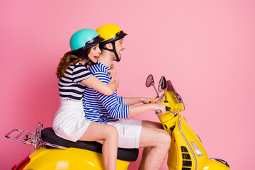 Canvas Print - Profile side view portrait of his he her she nice attractive cheerful cheery glad couple riding moped having fun enjoying weekend day having fun adventure isolated on pink pastel color background