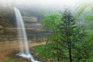Wall Mural - Spring landscape of Munising Falls captured with motion blur, Michigan's Upper Peninsula, USA