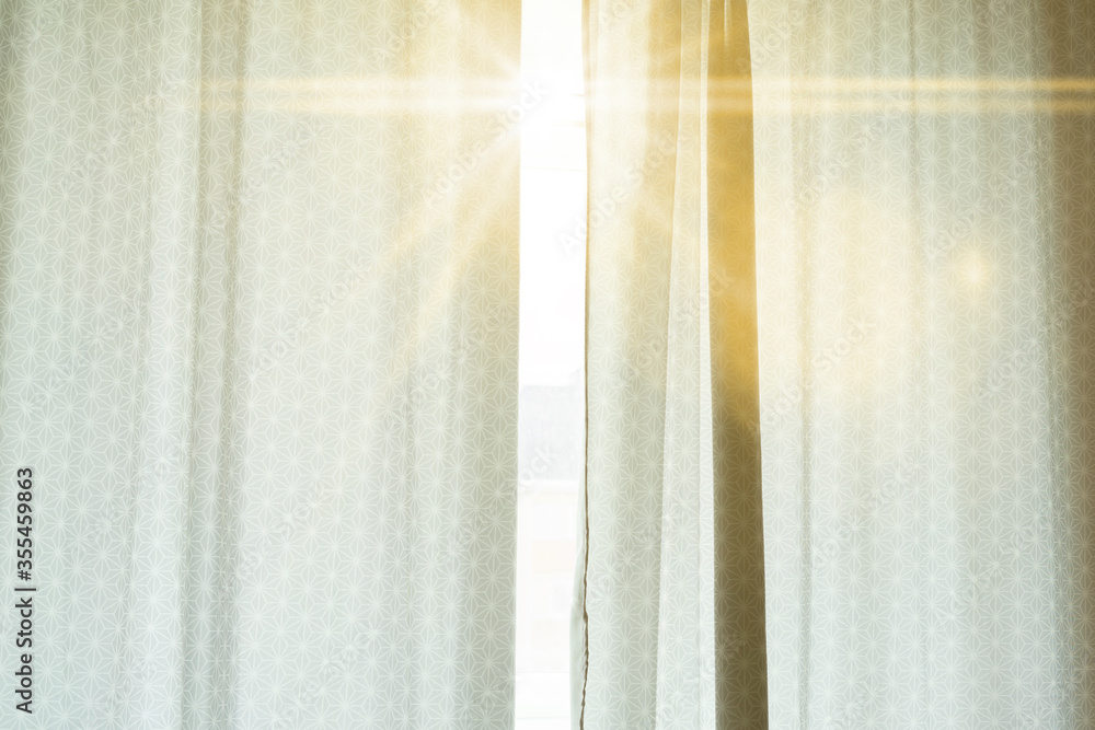 the window with curtains and a sun beam go through, wake up, early morning time - obrazy, fototapety, plakaty 