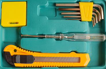 Layout of carpentry tools. Set of hand building tools in a box.