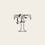 Fototapeta  - Graceful Floral Letter T Luxury Logo Icon . Black and White Outline simple beautiful logo. Vintage drawn alphabet in art nature leaf style.