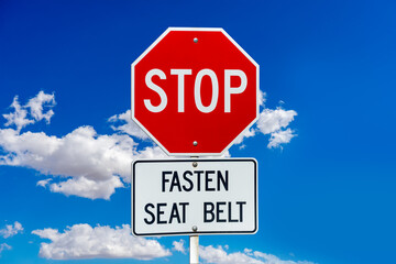 Red Stop and Fasten Seat Belt signs