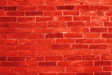 Red brick wall background inside of the room.