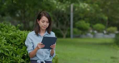 Sticker - Woman work on tablet computer at park