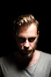 © _robbie_ - A bearded caucasian male model looking intenselyat the camera wearing a gray shirt