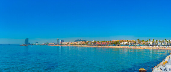 Wall Mural - Summer day at Barceloneta beach in Barcelona, Spain