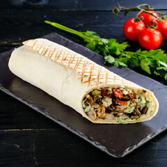 Sticker - turkish shawarma with chicken and lamb in pita bread