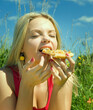 girl eats pizza.basket lunch
