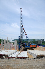 Wall Mural - MELAKA, MALAYSIA -SEPTEMBER 18, 2016: Piling machine at the construction site. Handle manually by the workers. 
