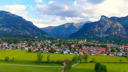 Aerial view over the city of Oberammergau in Bavaria Germany. High quality 4k drone footage