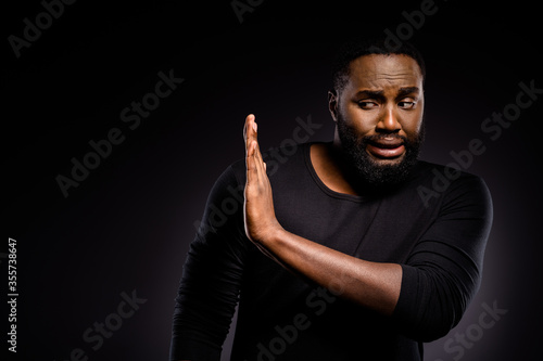 Photographie Photo of upset frustrated afro american guy hold hand copyspace cry cant tolerat