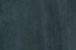 © Dmitrii - Old teal leather texture background. closeup view of suede