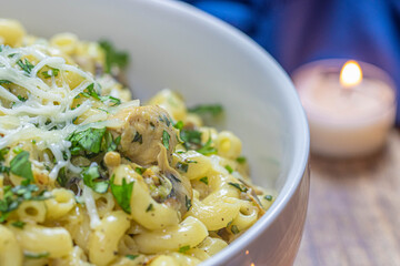 Creamy chicken pasta with mushroom and cheese.