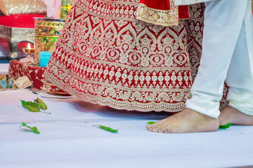 Indian Hindu wedding ceremony and pooja ritual items, hands, and decorations close ups