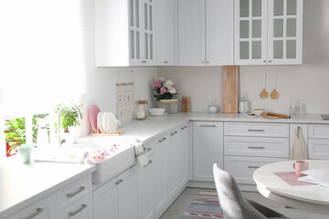 Wall Mural - Beautiful kitchen interior with new stylish furniture