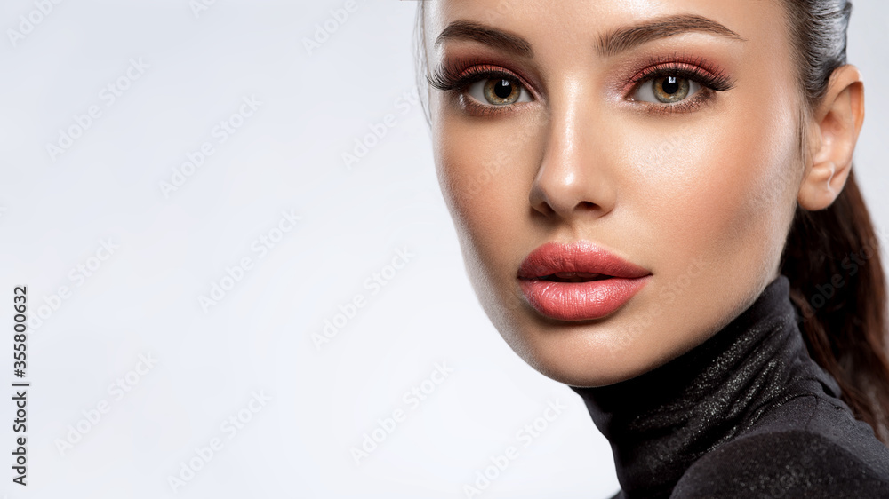 Portrait of beautiful young woman with bright pink makeup. Beautiful brunette with bright orange lipstick on her lips. - obrazy, fototapety, plakaty 