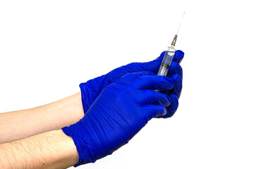 hands in blue protective medical gloves hold a syringe on the white background