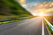 © ABCDstock - Motion blurred road and mountains at sunrise.mountain road background.