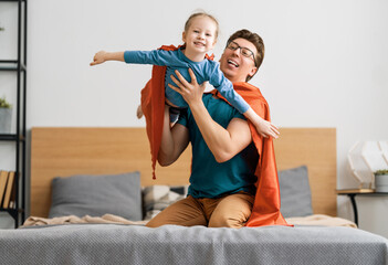 Canvas Print - Girl and daddy in Superhero costume