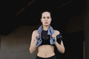 Portrait of a sporty girl before jogging. Active lifestyle concept