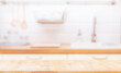 © escapejaja - Wood table top on blur kitchen room background. can be used for display or montage your products