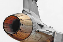 Rear Part Of The Fighter Plane On A White Background.