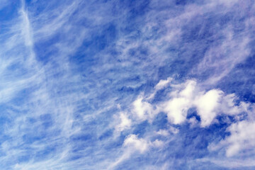 Wall Mural - Cirrus clouds in the sky background, texture. smoky, because they consist entirely of ice crystals falling in the atmosphere