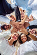 © Prostock-studio - United Business Team Of Colleagues Holding Hands, Bottom View