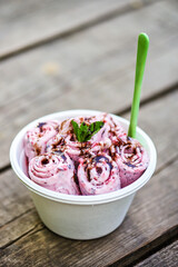 Aufkleber - Berry ice cream with mint leaf on gray wooden background