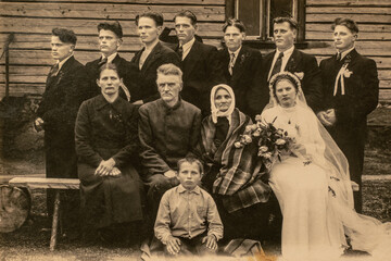 Wall Mural - RUSSIA - CIRCA 1920s: Group photo of wedding guests. Vintage historical archive photo