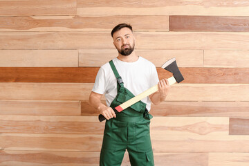 Sticker - Handsome lumberjack on wooden background