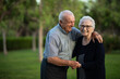© Mar - Elderly couple hugging at the park