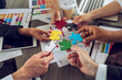 © alphaspirit - Teamwork of partners. Concept of integration and startup with puzzle pieces