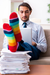 young male businessman working at home