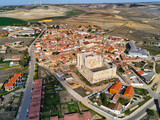 Fototapeta Las - 
Castle in Palencia. Aerial view in Fuentes de Valdepero. Spain. Drone Photo

