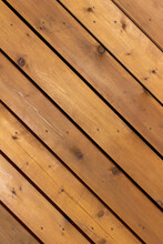 Close Up Abstract Texture Background Of A Newly Constructed Cedar Wood Deck Floor, Having A Diagonal Layout Design, With Copy Space