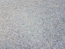 Tiny Grey And Blue Pebbles Or Gravel On The Ground