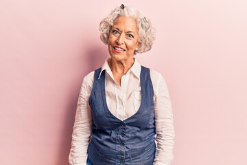 Wall Mural - Senior grey-haired woman wearing casual clothes with a happy and cool smile on face. lucky person.