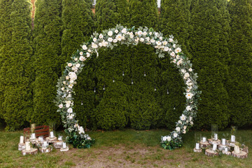 round flower arch in rustic style