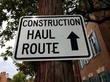 Construction Haul Route Sign With Arrow On Post