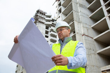 Engineer Working on Building Site